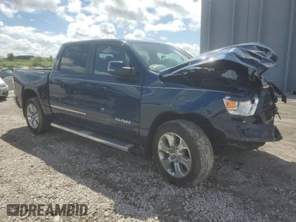 2023 Ram 1500 Big Horn z VIN 1C6RREFT0PN603949, wystawiony jako Copart lot #81781945 z przebiegiem 27 265 mil mil oraz Nie do naprawy • Non repairable. Historia ofert i sprzedaży dostępna na DreamBid. Obrazek 4.