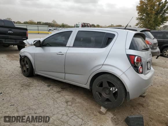 2014 Chevrolet Sonic LS с VIN 1G1JB6SH8E4116933, выставлен на аукционе Copart как лот 78400734 с пробегом Не указан миль и Списание • Salvage title. История ставок и продаж доступна на DreamBid. Изображение 2.