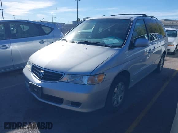 2002 Honda Odyssey EX z VIN 2HKRL18632H555706, wystawiony jako IAAI lot #43552585 z przebiegiem 183 324 mil mil oraz . Historia ofert i sprzedaży dostępna na DreamBid. Obrazek 2.