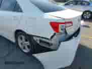 2014 Toyota Camry SE with VIN 4T1BF1FK3EU809509, listed as a IAAI auction lot 43321909 with 212,454 mi miles and . Bid and sale history available at DreamBid. Image 6.