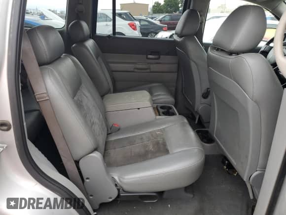 2007 Dodge Durango Limited z VIN 1D8HB58267F542762, wystawiony jako Copart lot #73023394 z przebiegiem 156 669 mil mil oraz Szkoda całkowita • Salvage title. Historia ofert i sprzedaży dostępna na DreamBid. Obrazek 11.