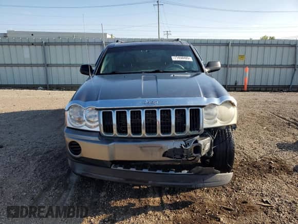 2007 Jeep Grand Cherokee Laredo with VIN 1J8GR48KX7C593322, listed as a Copart auction lot 71458485 with 166,252 mi miles and Salvage title. Bid and sale history available at DreamBid. Image 5.