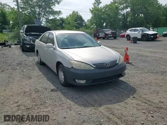 2005 Toyota Camry STD с VIN 4T1BE32K15U085484, выставлен на аукционе Copart как лот 61790455 с пробегом 226 914 миль миль и Списание • Salvage title. История ставок и продаж доступна на DreamBid. Изображение 13.