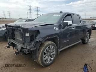 2023 GMC Sierra 1500 Denali with VIN 3GTUUGE81PG199076, listed as a Copart auction lot 54192795 with 64,411 mi miles and Salvage title. Bid and sale history available at DreamBid. Image 1.