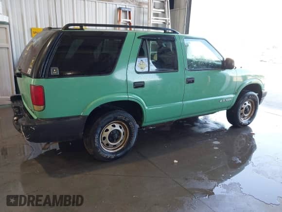 2003 Chevrolet Blazer LS with VIN 1GNDT13XX3K167585, listed as a IAAI auction lot 43350748 with 157,980 mi miles and . Bid and sale history available at DreamBid. Image 4.