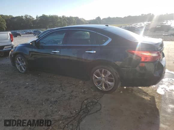 2016 Nissan Altima SR with VIN 1N4AL3AP2GC194683, listed as a Copart auction lot 71788155 with 121,994 mi miles and Salvage title. Bid and sale history available at DreamBid. Image 2.