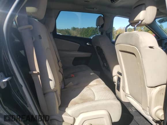 2012 Dodge Journey SXT z VIN 3C4PDCBG2CT297939, wystawiony jako Copart lot #87102945 z przebiegiem 189 593 mil mil oraz Szkoda całkowita • Salvage title. Historia ofert i sprzedaży dostępna na DreamBid. Obrazek 11.