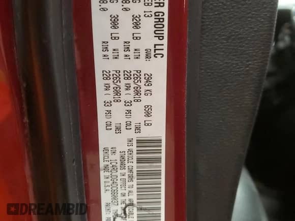 2013 Dodge Durango Crew with VIN 1C4RDJDG4DC660037, listed as a Copart auction lot 87818265 with Not provided miles and Salvage title. Bid and sale history available at DreamBid. Image 16.