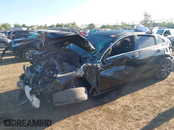 2020 Chevrolet Malibu RS with VIN 1G1ZG5STXLF145726, listed as a IAAI auction lot 43083676 with 85,180 mi miles and . Bid and sale history available at DreamBid. Image 2.