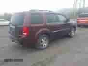 2010 Honda Pilot Touring with VIN 5FNYF4H91AB013855, listed as a IAAI auction lot 43258943 with 245,204 mi miles and . Bid and sale history available at DreamBid. Image 4.