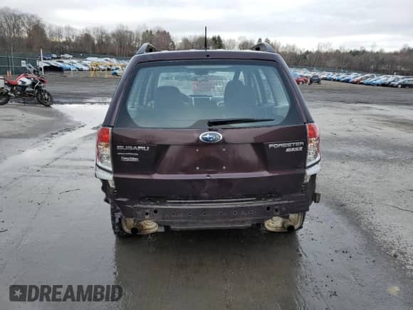 2013 Subaru Forester X z VIN JF2SHABC2DG428777, wystawiony jako Copart lot #52517655 z przebiegiem 131 275 mil mil oraz Szkoda całkowita • Salvage title. Historia ofert i sprzedaży dostępna na DreamBid. Obrazek 6.