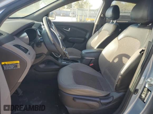2011 Hyundai Tucson Limited with VIN KM8JU3AC7BU213263, listed as a Copart auction lot 52646455 with 165,236 mi miles and Salvage title. Bid and sale history available at DreamBid. Image 7.