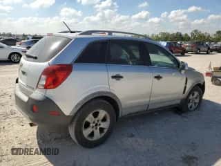 2014 Chevrolet Captiva Sport LS with VIN 3GNAL2EK8ES657346, listed as a Copart auction lot 77226774 with 164,497 mi miles and Salvage title. Bid and sale history available at DreamBid. Image 3.