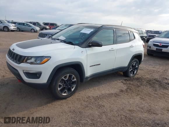 2018 Jeep Compass Trailhawk z VIN 3C4NJDDB8JT234574, wystawiony jako IAAI lot #43049041 z przebiegiem 93 968 mil mil oraz . Historia ofert i sprzedaży dostępna na DreamBid. Obrazek 18.