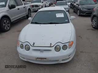 2000 Hyundai Tiburon с VIN KMHJG35F6YU167638, выставлен на аукционе IAAI как лот 42335613 с пробегом 254 361 миль миль и . История ставок и продаж доступна на DreamBid. Изображение 6.