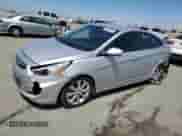 2014 Hyundai Accent GLS z VIN KMHCU4AEXEU624371, wystawiony jako Copart lot #66858945 z przebiegiem 199 501 mil mil oraz Szkoda całkowita • Salvage title. Historia ofert i sprzedaży dostępna na DreamBid. Obrazek 1.