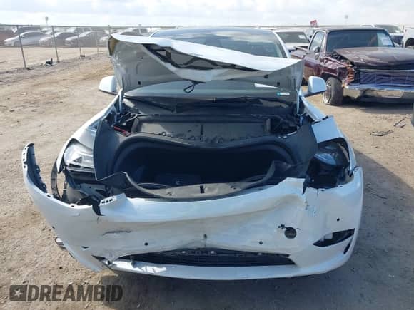 2022 Tesla Model Y Long Range z VIN 7SAYGDEEXNF353853, wystawiony jako IAAI lot #42792563 z przebiegiem 84 692 mil mil oraz . Historia ofert i sprzedaży dostępna na DreamBid. Obrazek 11.