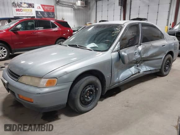 1995 Honda Accord LX with VIN 1HGCD5637SA100093, listed as a IAAI auction lot 43136050 with 153,199 mi miles and . Bid and sale history available at DreamBid. Image 17.