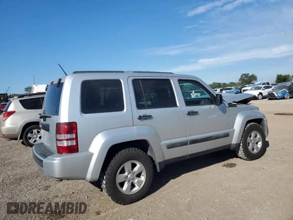 2011 Jeep Liberty Sport with VIN 1J4PN2GK1BW520494, listed as a Copart auction lot 69432985 with 97,037 mi miles and Salvage title. Bid and sale history available at DreamBid. Image 3.