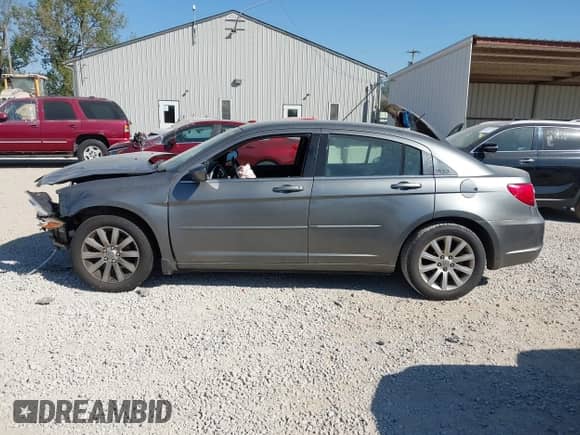 2013 Chrysler 200 Touring with VIN 1C3CCBBG0DN703489, listed as a IAAI auction lot 43361410 with 121,917 mi miles and . Bid and sale history available at DreamBid. Image 15.