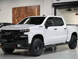 2020 Chevrolet Silverado 1500 LT Trail Boss z VIN 1GCPYFED4LZ363794, wystawiony jako Copart lot #84549665 z przebiegiem 26 773 mil mil oraz Czysty tytuł • Clean title. Historia ofert i sprzedaży dostępna na DreamBid. Obrazek 1.