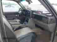 2004 Chevrolet Suburban LT z VIN 1GNEC16Z74J107885, wystawiony jako IAAI lot #42686925 z przebiegiem 232 388 mil mil oraz . Historia ofert i sprzedaży dostępna na DreamBid. Obrazek 5.