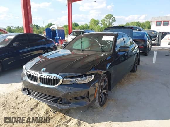 2022 BMW 3 Series 330i with VIN WBA5R1C05NFL77244, listed as a IAAI auction lot 41667834 with 38,964 mi miles and . Bid and sale history available at DreamBid. Image 2.