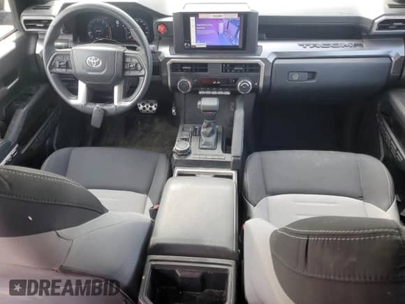 2024 Toyota Tacoma SR5 with VIN 3TYLB5JN2RT055045, listed as a Copart auction lot 69134065 with 25,584 mi miles and Salvage title. Bid and sale history available at DreamBid. Image 8.