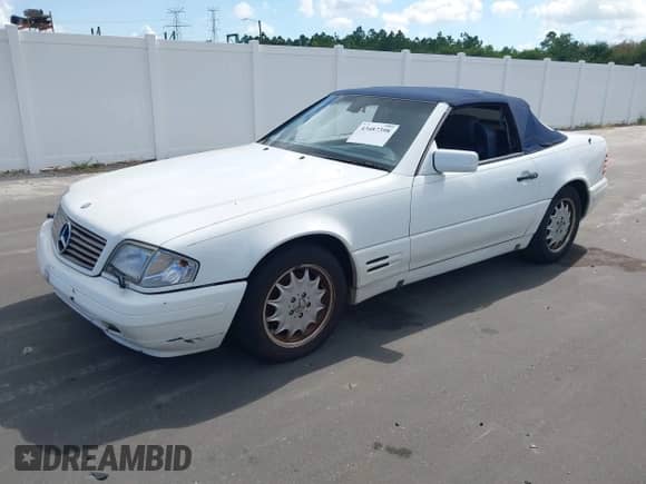 1997 Mercedes-Benz SL 500 с VIN WDBFA63F7VF145257, выставлен на аукционе IAAI как лот 43487398 с пробегом 98 593 миль миль и . История ставок и продаж доступна на DreamBid. Изображение 2.