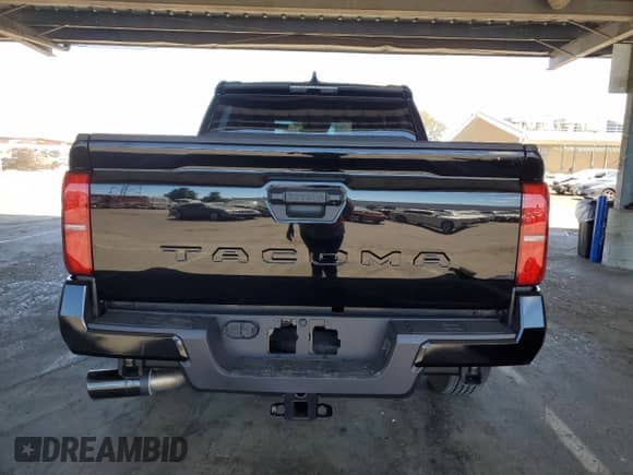 2024 Toyota Tacoma SR5 with VIN 3TMKB5FN9RM023449, listed as a Copart auction lot 67866095 with 5,550 mi miles and Salvage title. Bid and sale history available at DreamBid. Image 6.
