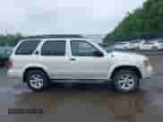 2003 Nissan Pathfinder LE z VIN JN8DR09Y93W817442, wystawiony jako IAAI lot #42513680 z przebiegiem 249 102 mil mil oraz . Historia ofert i sprzedaży dostępna na DreamBid. Obrazek 13.