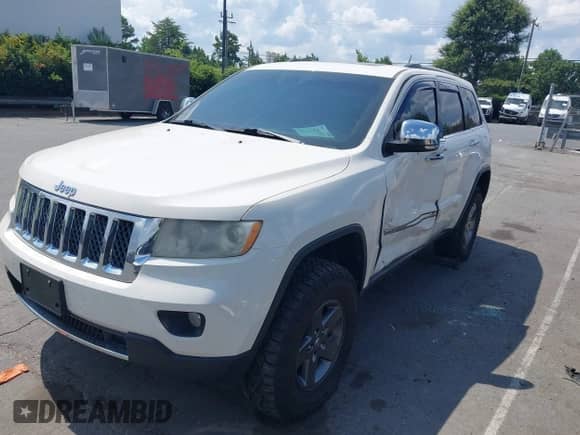 2012 Jeep Grand Cherokee Overland z VIN 1C4RJFCT1CC171419, wystawiony jako IAAI lot #42824161 z przebiegiem 172 345 mil mil oraz . Historia ofert i sprzedaży dostępna na DreamBid. Obrazek 17.