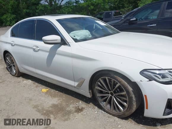 2021 BMW 5 Series 530i with VIN WBA53BH00MCG14421, listed as a IAAI auction lot 42216707 with 28,932 mi miles and . Bid and sale history available at DreamBid. Image 13.