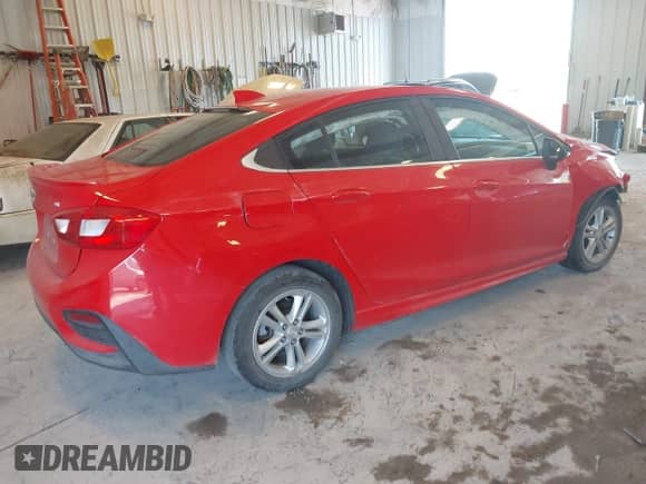 2017 Chevrolet Cruze LT with VIN 1G1BE5SM2H7153000, listed as a IAAI auction lot 42792431 with 34,011 mi miles and . Bid and sale history available at DreamBid. Image 4.