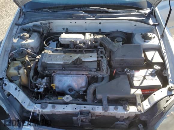 2003 Hyundai Accent GL с VIN KMHCG45C63U413388, выставлен на аукционе Copart как лот 88979235 с пробегом 240 928 миль миль и Списание • Salvage title. История ставок и продаж доступна на DreamBid. Изображение 11.