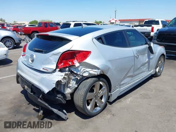 2013 Hyundai Veloster Turbo с VIN KMHTC6AE0DU177983, выставлен на аукционе IAAI как лот 42292102 с пробегом 121 142 миль миль и . История ставок и продаж доступна на DreamBid. Изображение 6.