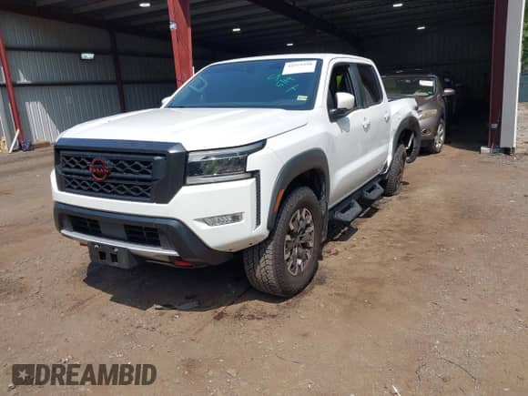 2023 Nissan Frontier Pro-4X with VIN 1N6ED1EK3PN614884, listed as a IAAI auction lot 42571950 with 13,307 mi miles and . Bid and sale history available at DreamBid. Image 2.