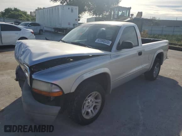 2004 Dodge Dakota z VIN 1D7FL16K44S506611, wystawiony jako Copart lot #82088555 z przebiegiem 264 052 mil mil oraz Szkoda całkowita • Salvage title. Historia ofert i sprzedaży dostępna na DreamBid. Obrazek 1.