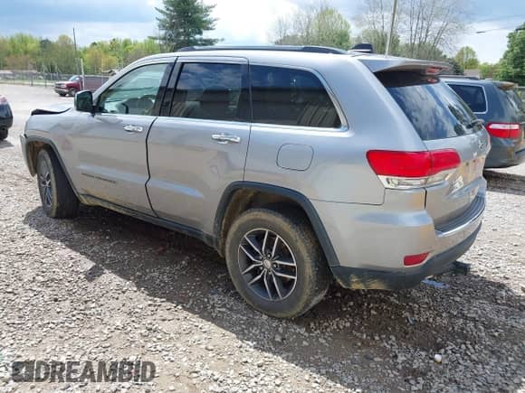 2017 Jeep Grand Cherokee Limited with VIN 1C4RJEBG4HC765329, listed as a IAAI auction lot 42008297 with 194,607 mi miles and . Bid and sale history available at DreamBid. Image 3.