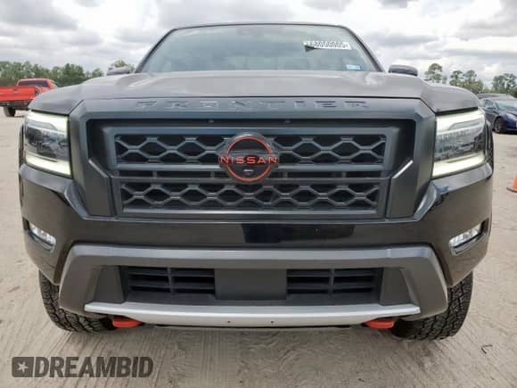 2023 Nissan Frontier Pro-4X with VIN 1N6ED1EKXPN668554, listed as a Copart auction lot 68050005 with 28,401 mi miles and Salvage title. Bid and sale history available at DreamBid. Image 5.