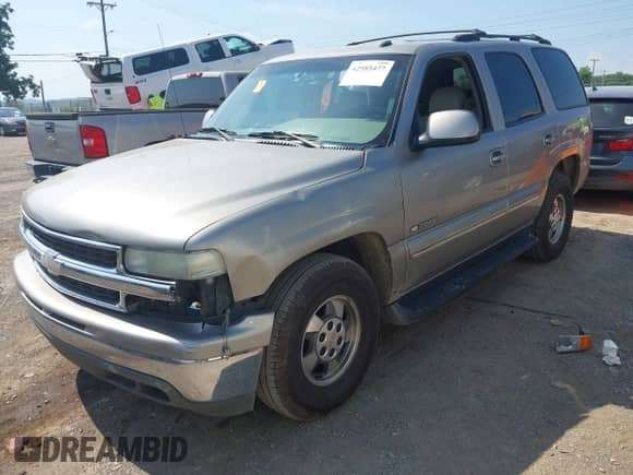 2003 Chevrolet Tahoe LT with VIN 1GNEC13Z13R265773, listed as a IAAI auction lot 42585477 with 229,851 mi miles and . Bid and sale history available at DreamBid. Image 2.