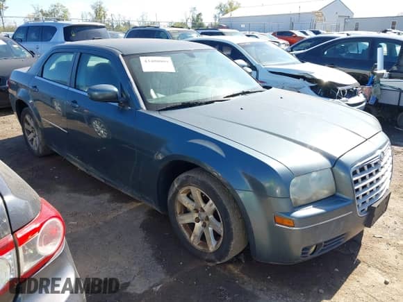 2006 Chrysler 300 Touring with VIN 2C3KA53G86H125820, listed as a IAAI auction lot 43400009 with 131,676 mi miles and . Bid and sale history available at DreamBid. Image 1.