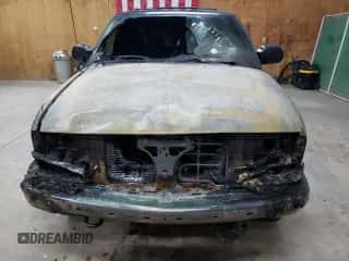 2000 Chevrolet Blazer LT с VIN 1GNDT13W0Y2221121, выставлен на аукционе Copart как лот 70241964 с пробегом Не указан миль и Чистый • Clean title. История ставок и продаж доступна на DreamBid. Изображение 5.