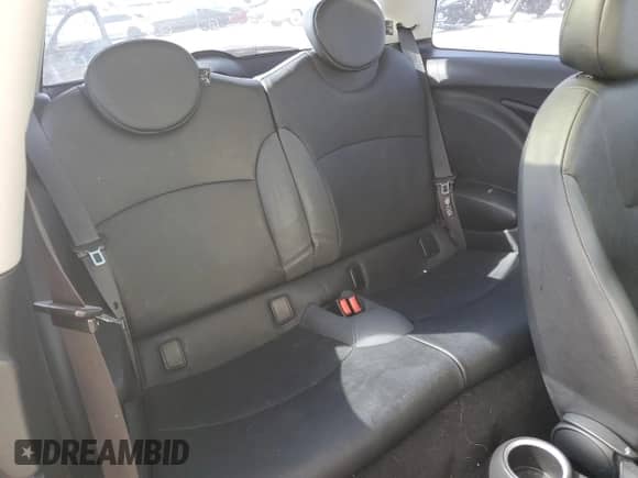 2007 MINI Hardtop with VIN WMWMF33547TT51590, listed as a Copart auction lot 57323995 with 114,113 mi miles and Salvage title. Bid and sale history available at DreamBid. Image 10.