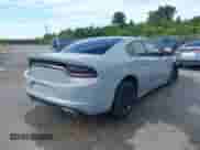 2021 Dodge Charger SXT with VIN 2C3CDXBG8MH632612, listed as a IAAI auction lot 42861245 with 68,640 mi miles and . Bid and sale history available at DreamBid. Image 4.