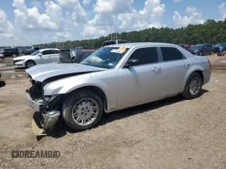 2007 Chrysler 300 with VIN 2C3KA43R07H667877, listed as a Copart auction lot 67415665 with 147,446 mi miles and Salvage title. Bid and sale history available at DreamBid. Image 1.