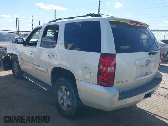 2008 Chevrolet Tahoe LTZ with VIN 1GNFC13J98R233238, listed as a IAAI auction lot 43315701 with Not provided miles and . Bid and sale history available at DreamBid. Image 3.