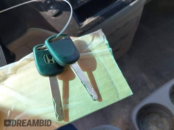 2004 Honda Odyssey LX with VIN 5FNRL18524B063998, listed as a IAAI auction lot 43022221 with 174,551 mi miles and . Bid and sale history available at DreamBid. Image 11.