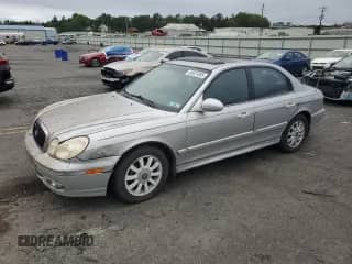 2002 Hyundai Sonata GLS with VIN KMHWF35H32A644979, listed as a Copart auction lot 69031885 with 74,164 mi miles and Clean title. Bid and sale history available at DreamBid. Image 1.