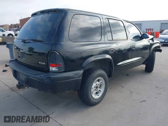 1999 Dodge Durango with VIN 1B4HS28Z0XF576557, listed as a IAAI auction lot 42727857 with 212,834 mi miles and . Bid and sale history available at DreamBid. Image 4.